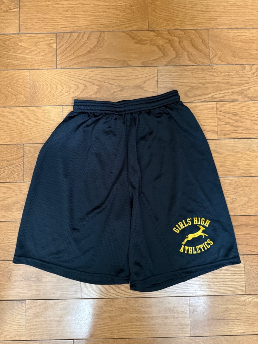 Black Athletic Mesh Shorts with Yellow Logo